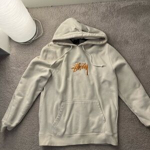 Stussy Cream Hoodie with Gold Logo